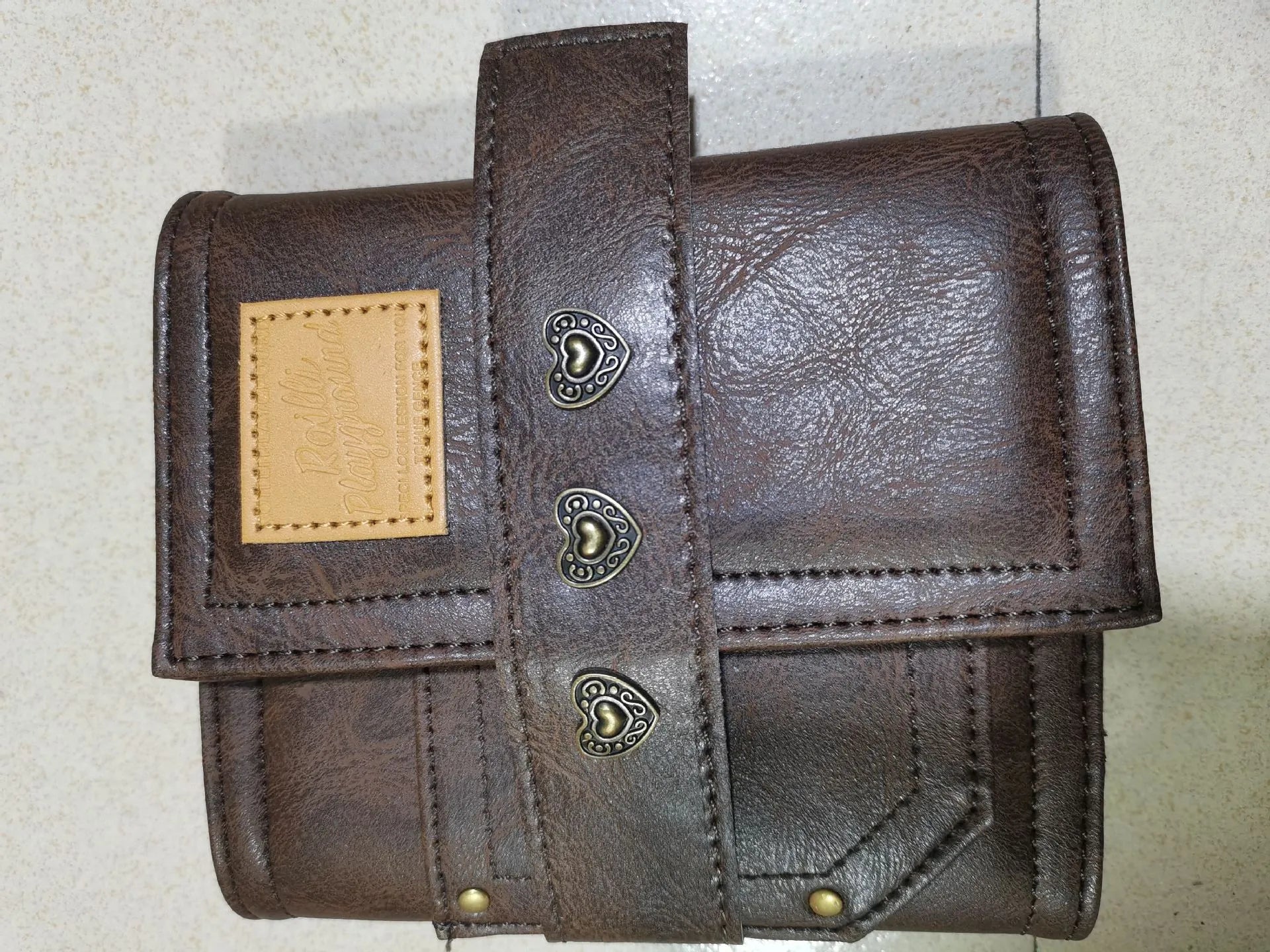 Brown retro leather buckle notebook with loose-leaf binding and PU cover