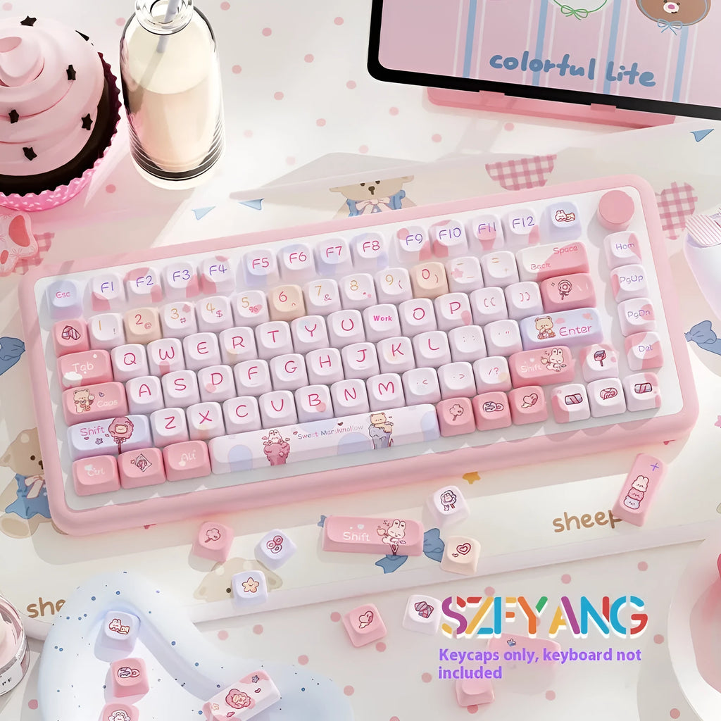 Sweet cotton candy coloured mechanical keyboard keycap set in a box.
