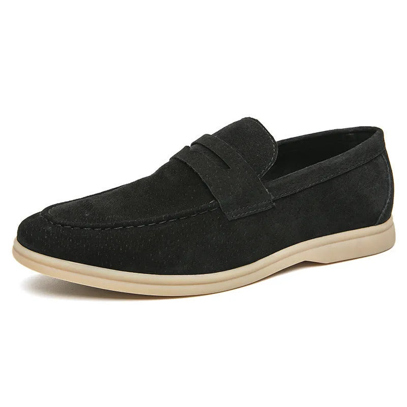 Men's black leather slip-on casual shoes with a round toe and rubber sole.