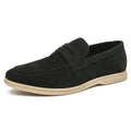 Men's black leather slip-on casual shoes with a round toe and rubber sole.