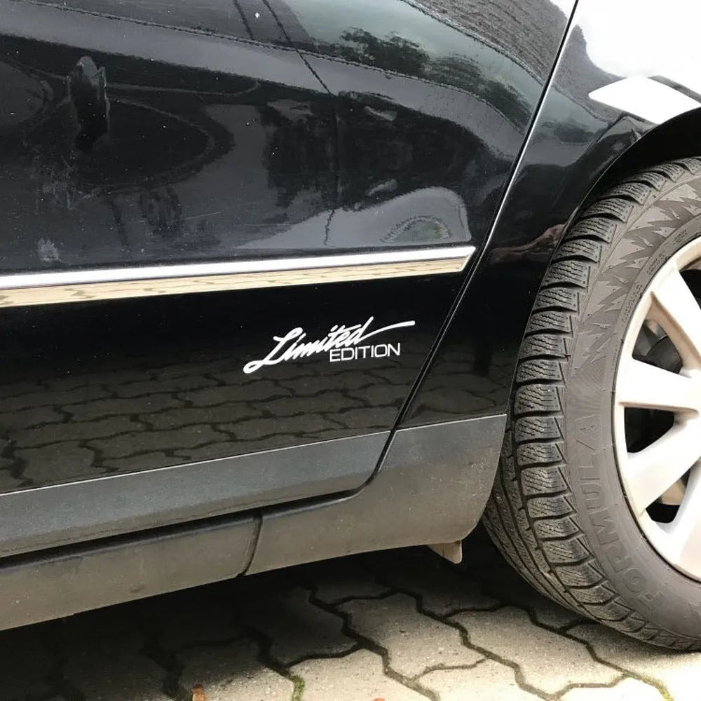 Reflective plastic bumper sticker in British style, showing black, white and colourful options next to a 16cm ruler.