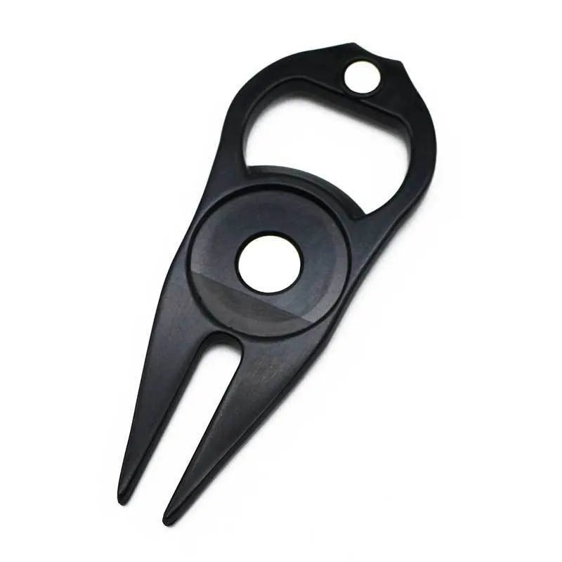 Zinc alloy golf ball yoke and bottle opener tool in black, green or silver on a putting green