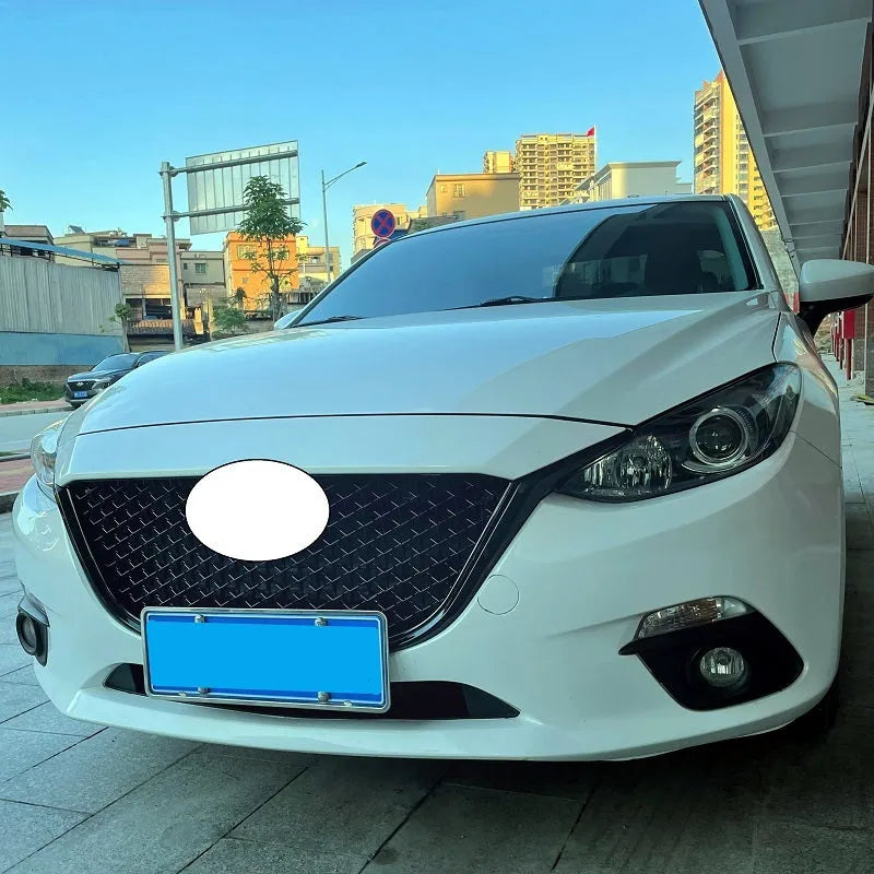 Audi A1 8X front splitter retrofit kit with three-section design in black Unksera pattern.