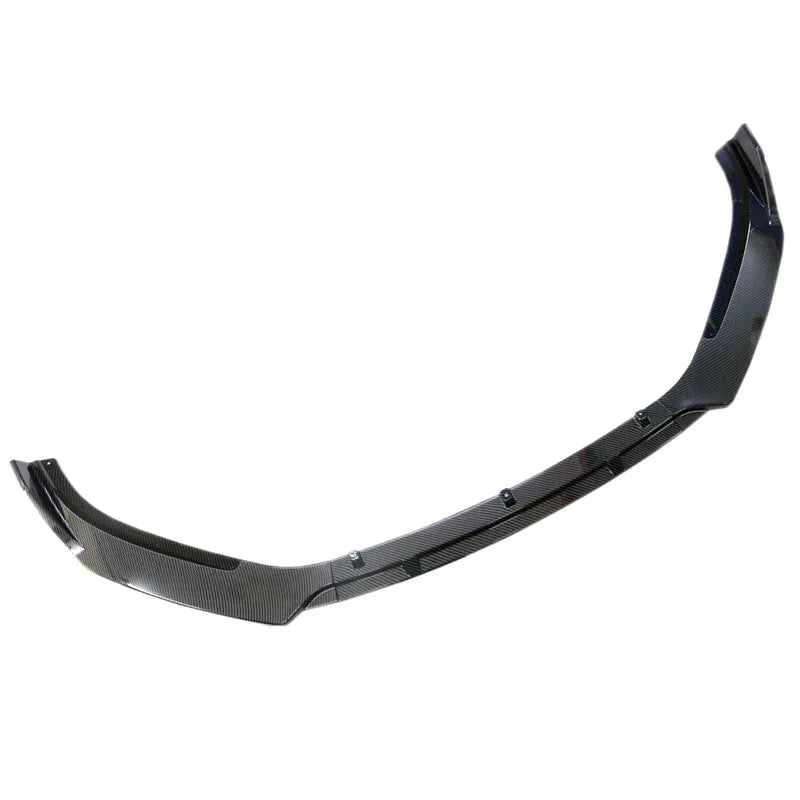 Audi A1 8X front splitter retrofit kit with three-section design in black Unksera pattern.