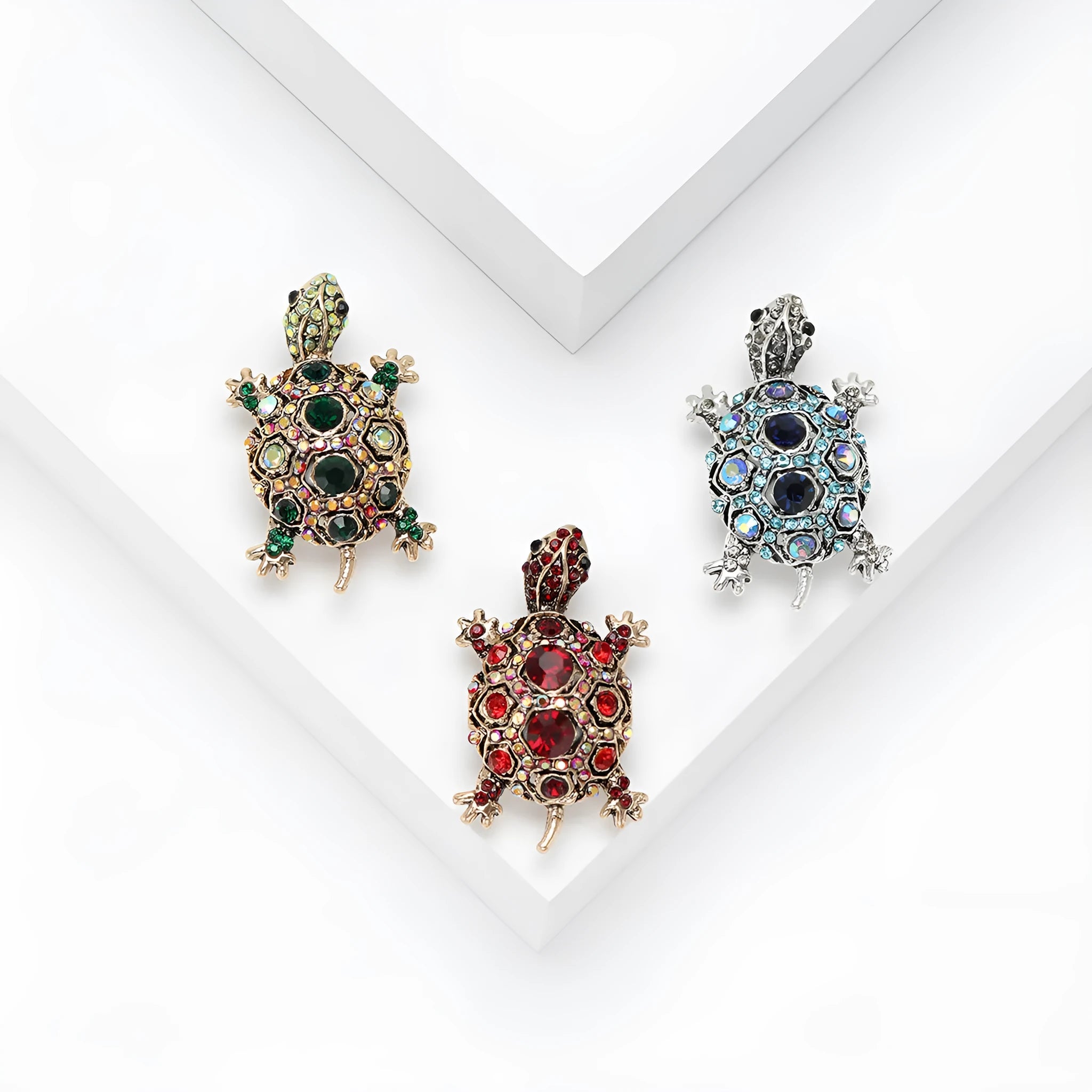 Fashion retro rhinestone turtle brooch in green on a textured surface