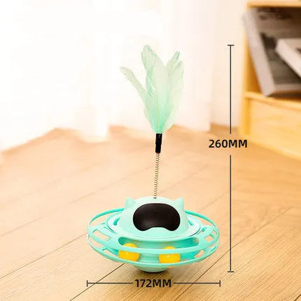 Pink cat tumbler turntable toy with rotating base and attached stick on white background