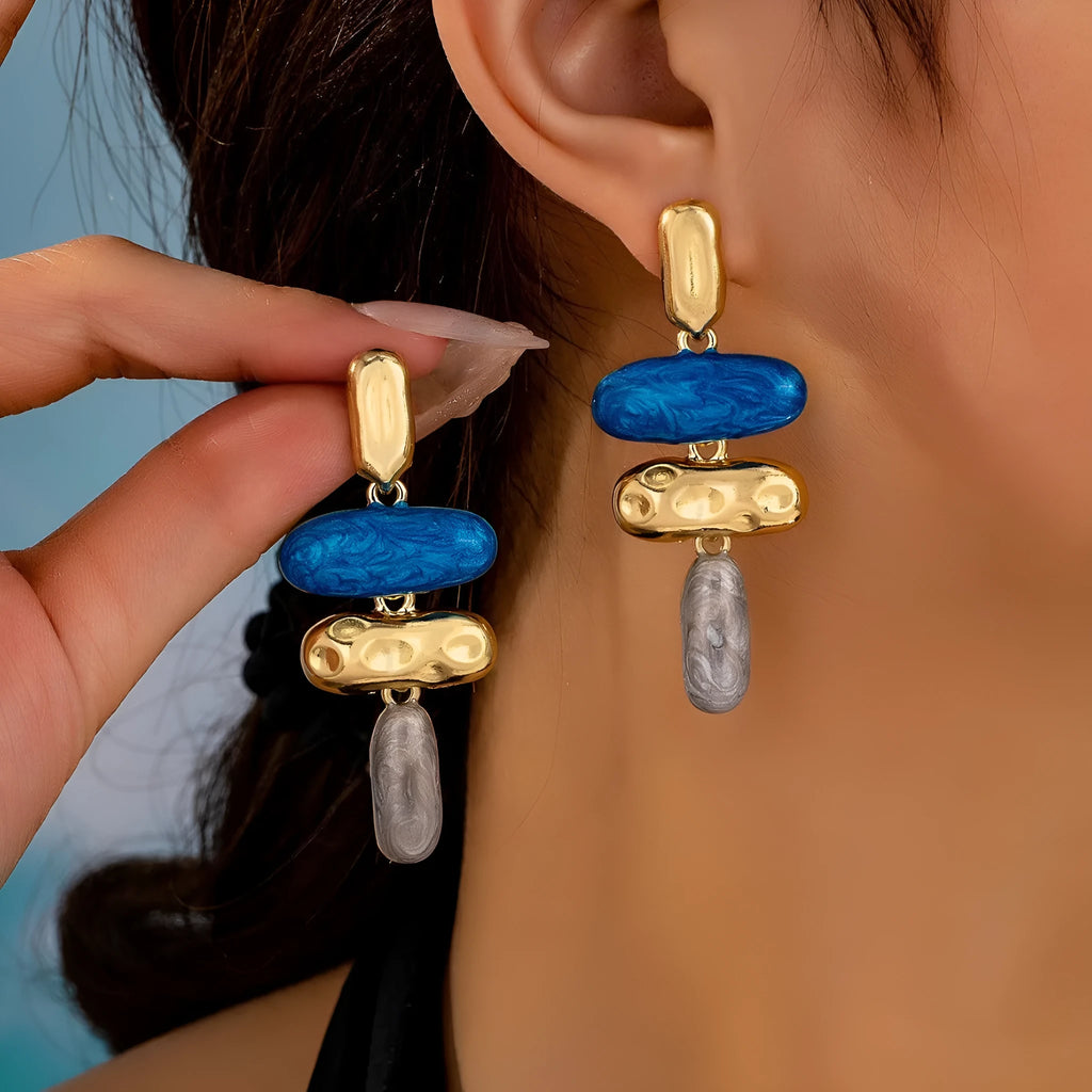 Women's geometric stud earrings with electroplated multicolour finish on zinc alloy