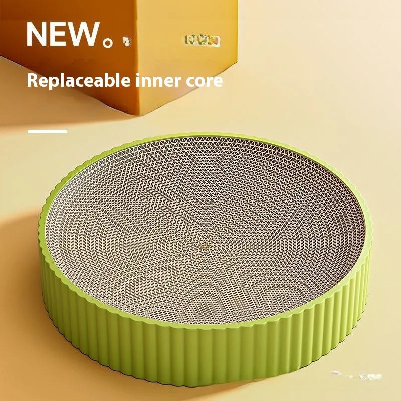 Round green cat scratching board with corrugated cardboard centre measuring 55cm diameter with replacement packs