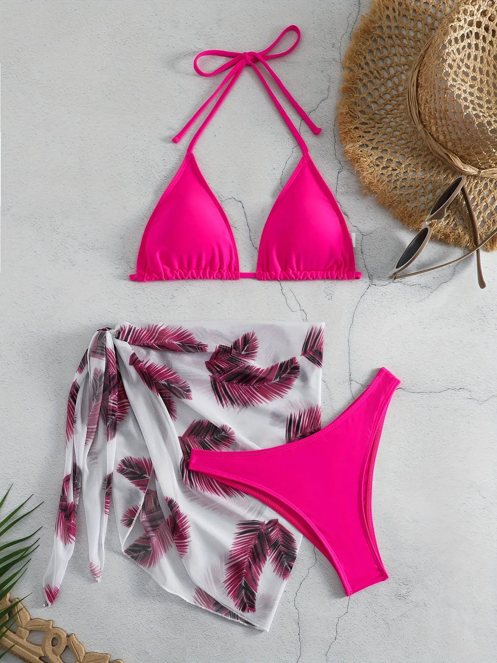 Three-piece bikini swimsuit set with printed gauze skirt in solid colour polyester, available in eight colours sizes XS to XL