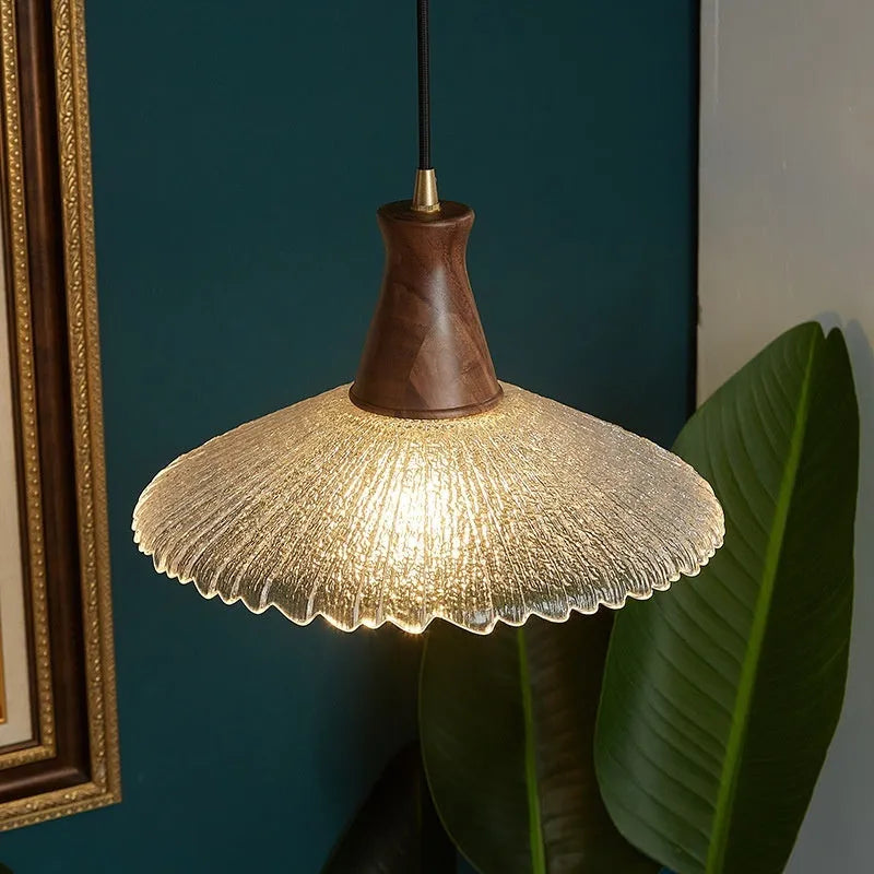 Wood and glass ceiling chandelier with brass finish, shown in small, medium and large sizes.