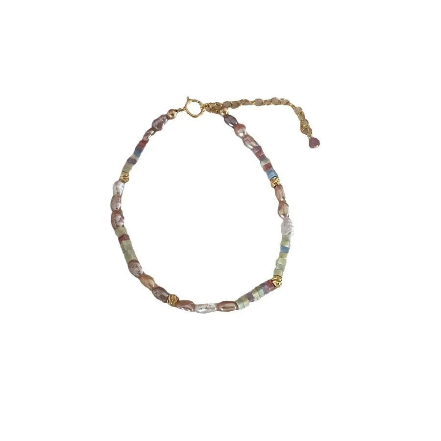 Women's pearl jewellery set with 14K gilded purple silver natural pearl bracelet and matching necklace