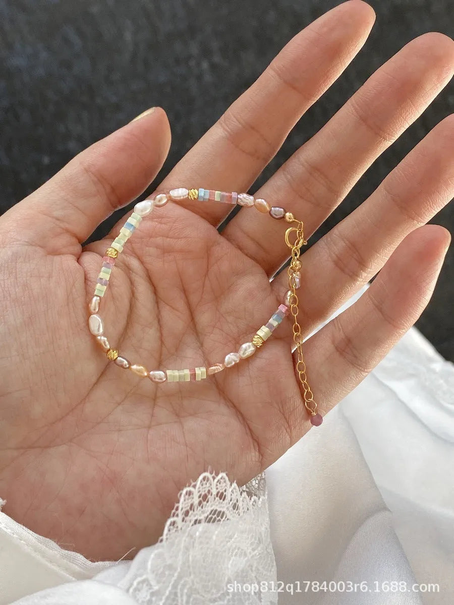 Women's pearl jewellery set with 14K gilded purple silver natural pearl bracelet and matching necklace