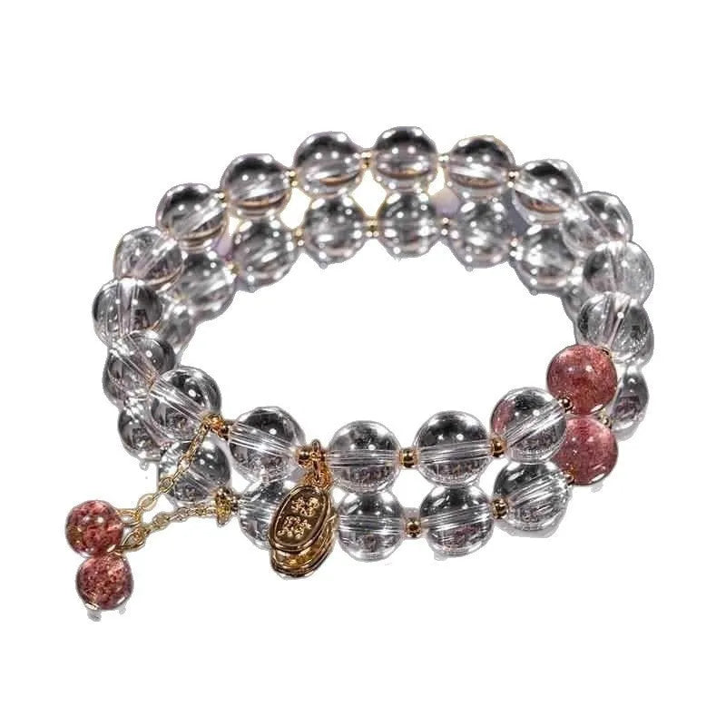 Natural white crystal lucky fortune bracelet on display with beads arranged in a U-shape on a neutral background.