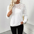 White floral print long sleeve polyester top with loose fit and pullover design