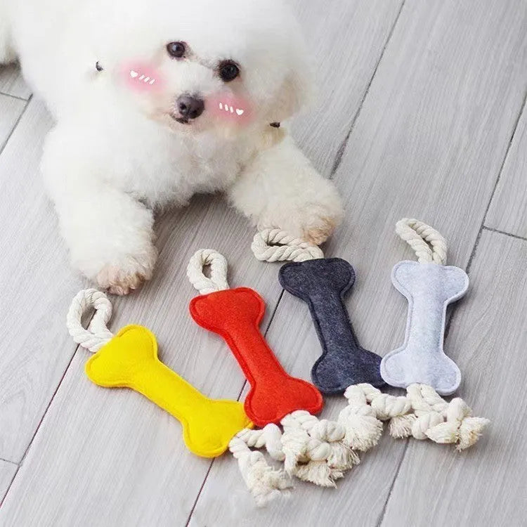 Bone-shaped dog toy with rope knot and felt construction in four colour options