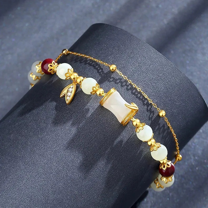 Retro unisex glass coloured glaze bracelet with flower-shaped Ruyi charm in green and electroplated finish