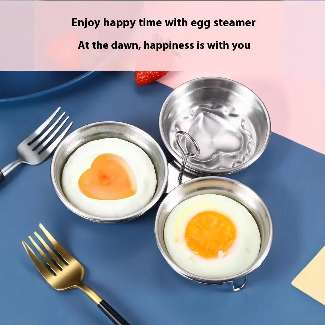 Small stainless steel heart-shaped egg steamer or round egg cooker for use on a hob.