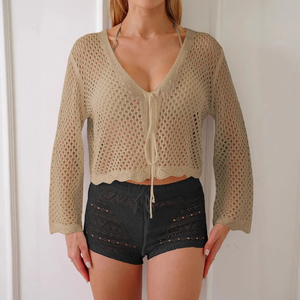 Women's apricot hollow woven cardigan blouse with bell sleeves, shown as a short-length layering piece.