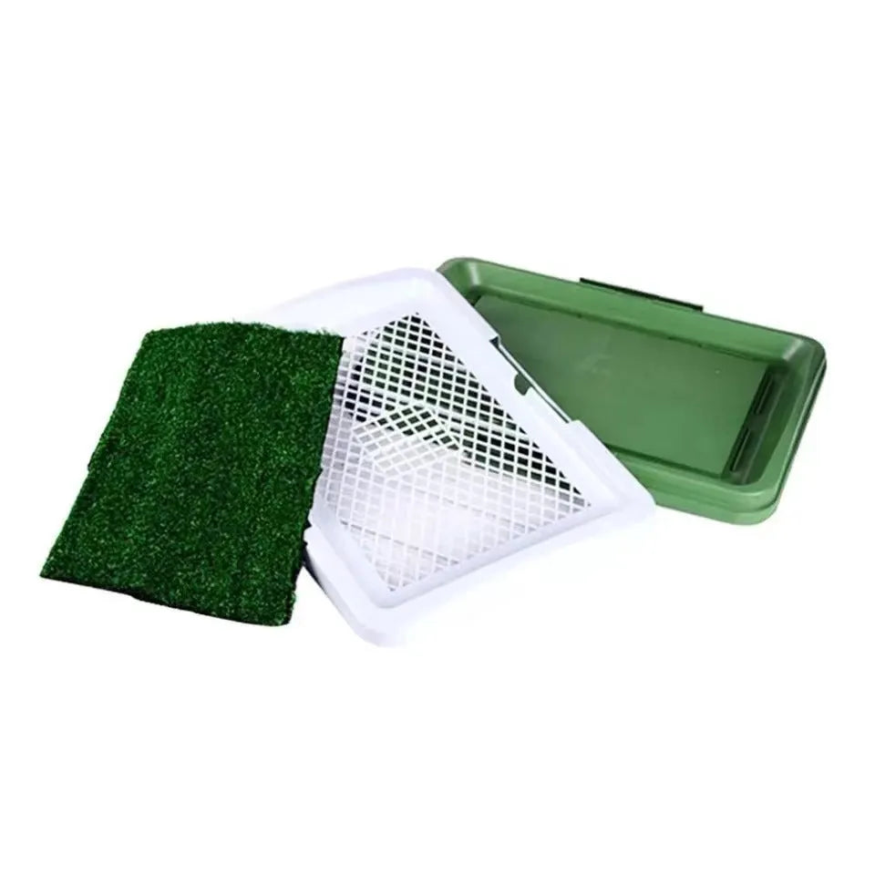 Green artificial grass indoor dog potty training tray with removable base, dimensions 50cm by 60cm.