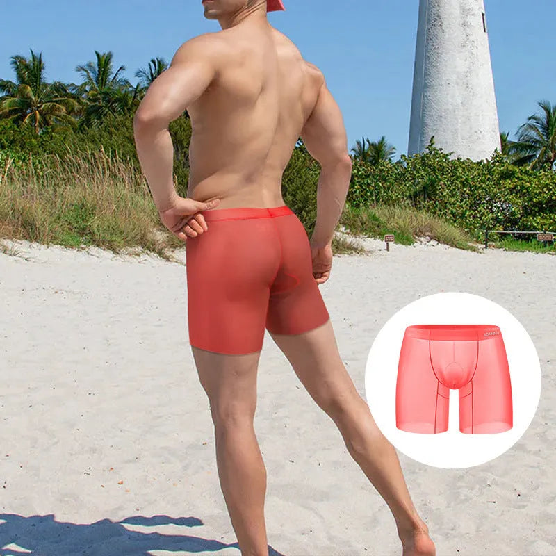 Men's nylon ice silk boxer shorts in solid orange, pink, or red colours with low-rise waistband