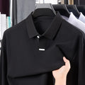 Men's grey pure cotton polo shirt with asymmetric lapel design and long sleeves, shown in a loose fit.