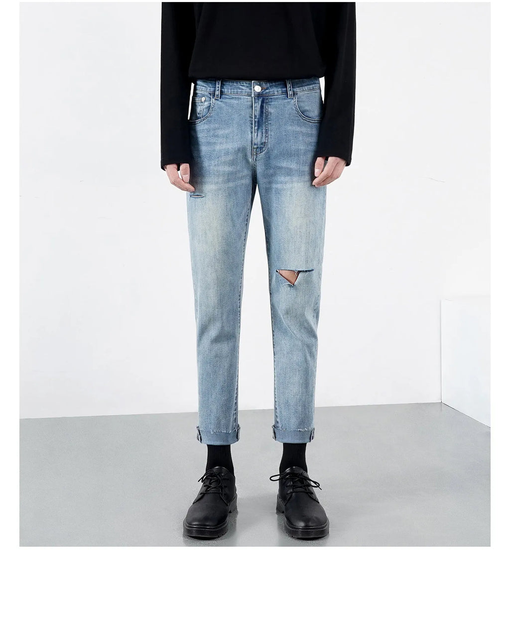 Men's light summer ripped jeans in blue with microelastic stretch denim, front view
