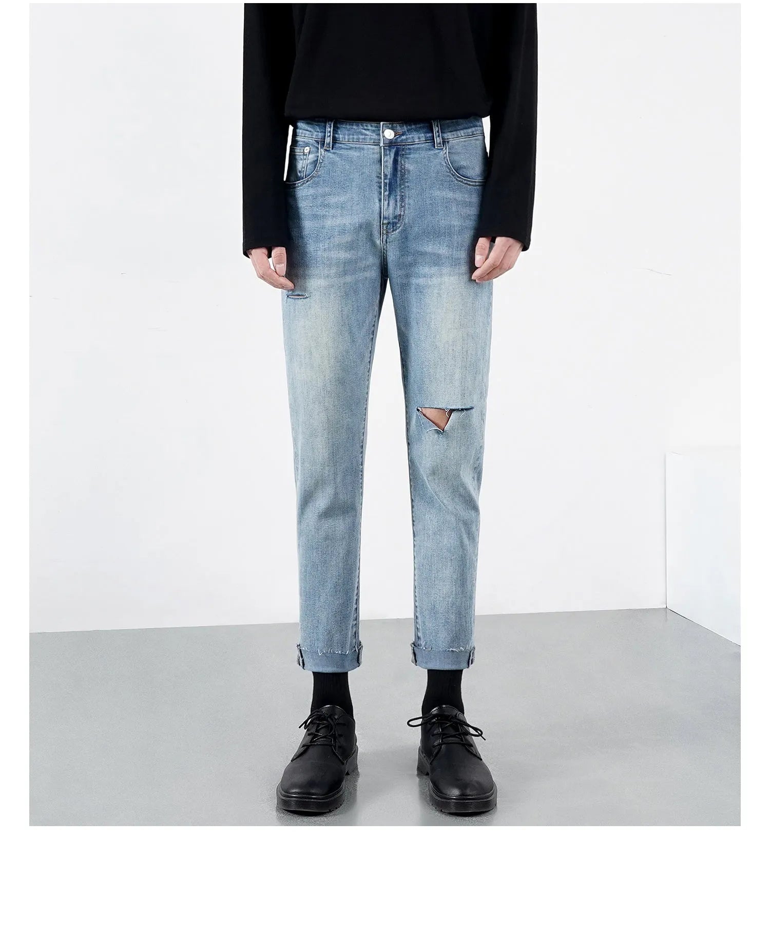 Men's light summer ripped jeans in blue with microelastic stretch denim, front view