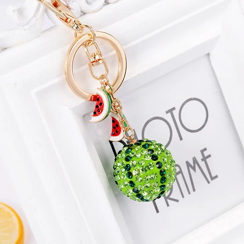 Green watermelon-shaped zinc alloy keychain measuring 12cm with metal chain attachment