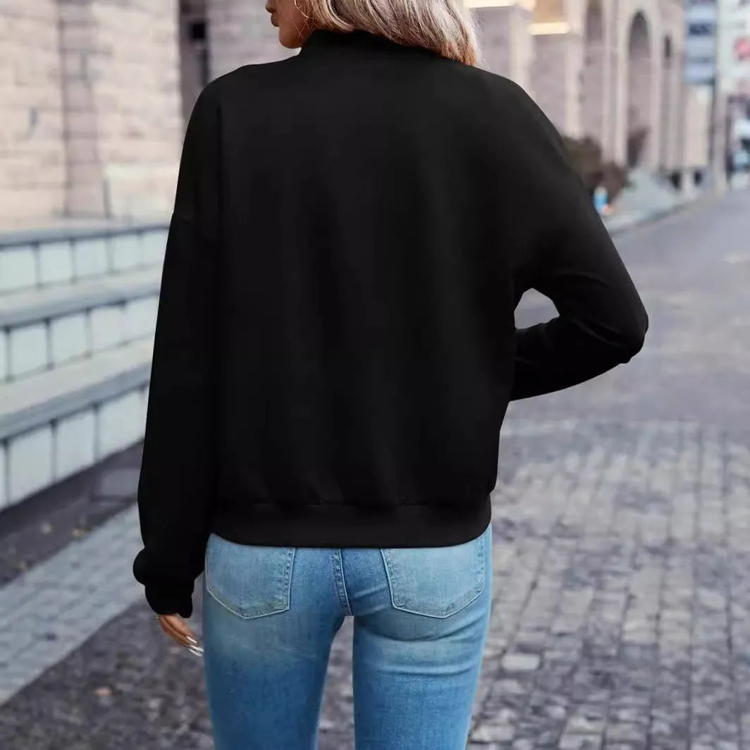 Black women's zip jacket with long sleeves and faux pockets