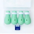 Four green silicone cat foot covers for scratch protection during pet washing and medicine administration