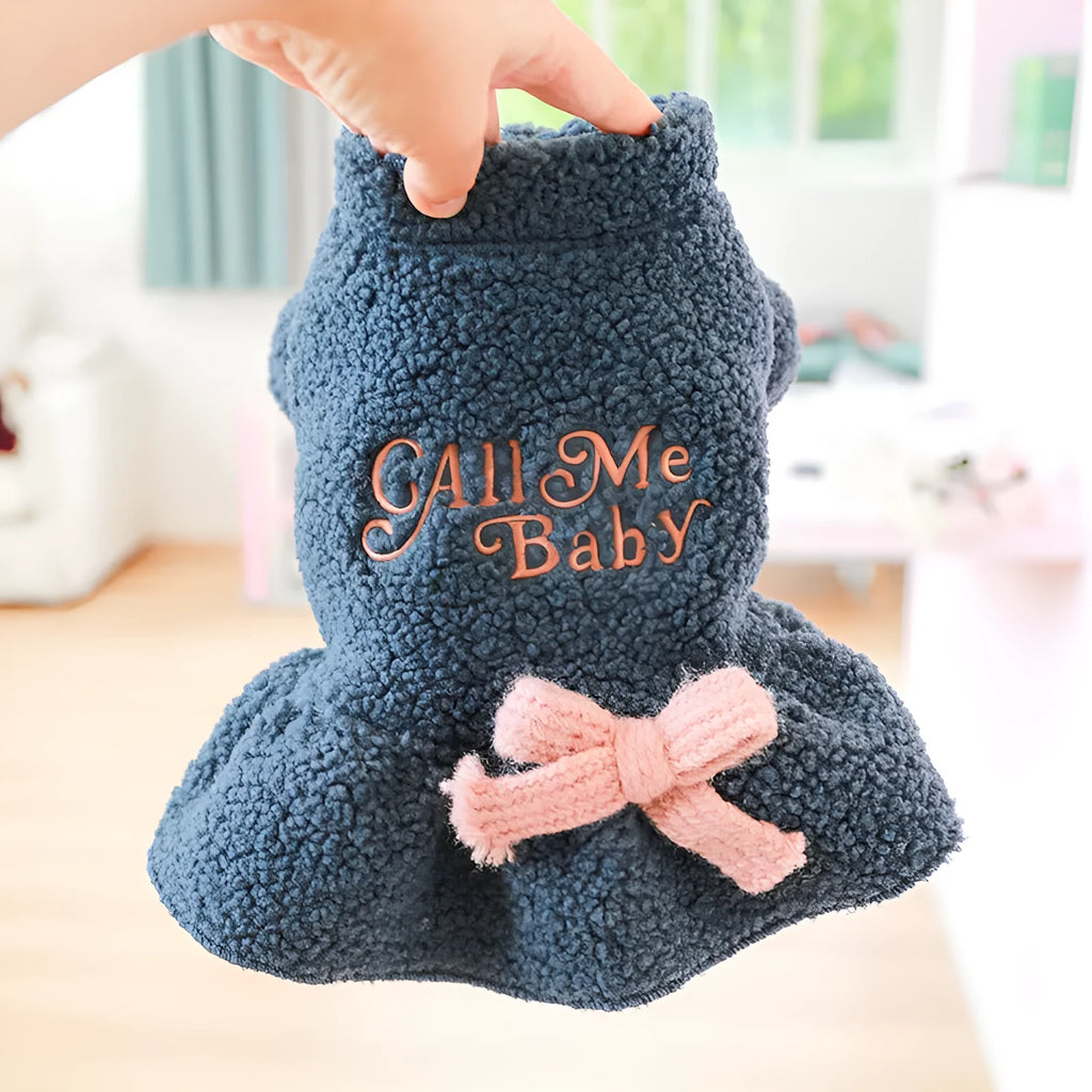 Pet clothing warm Berber fleece skirt in dark blue with letter print on a standing dog.