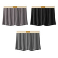 Pack of three men's solid colour loose fit ice silk boxer shorts on a mid waist.