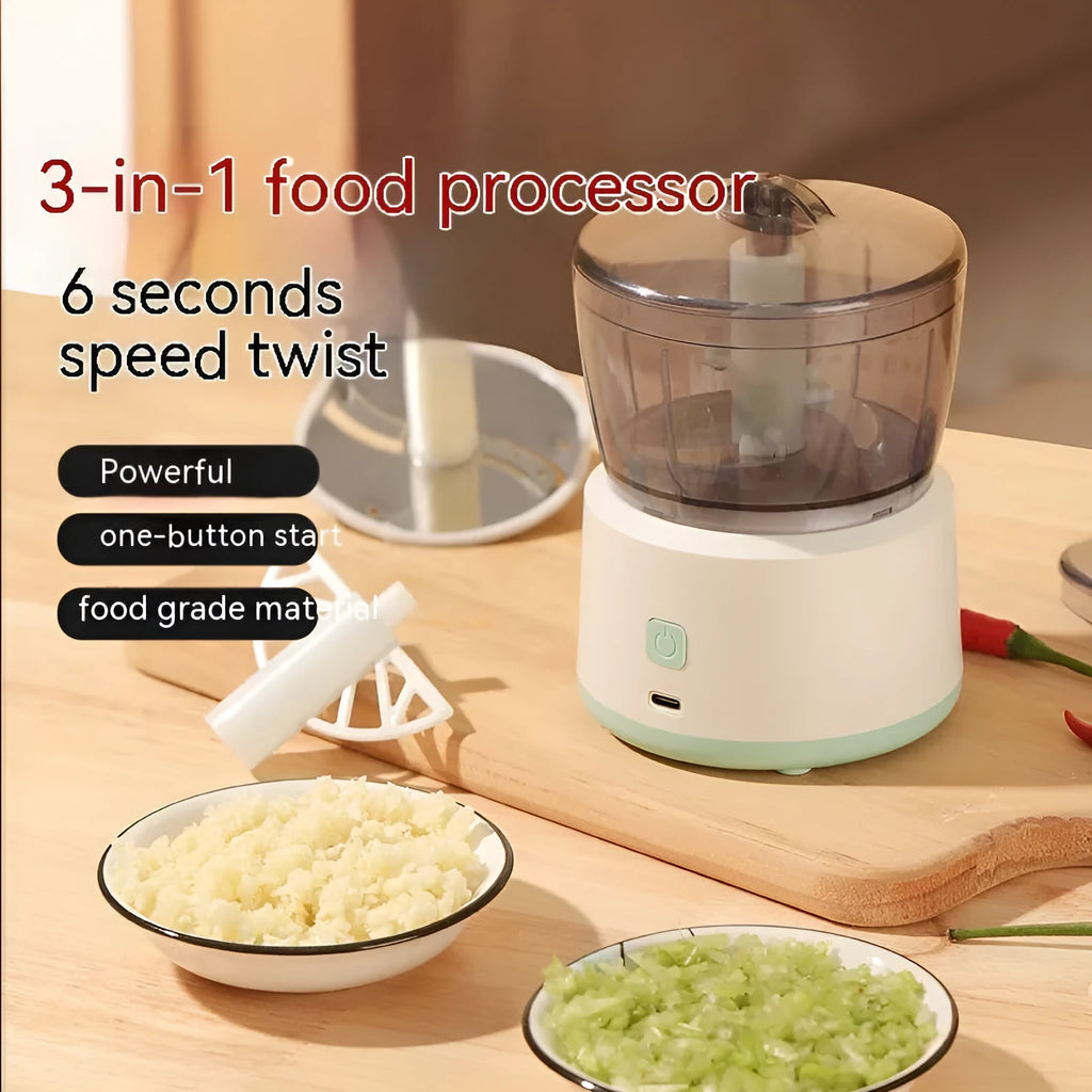 Mini meat grinder with white body, transparent 225ml cup, and anti-slip base on a kitchen countertop