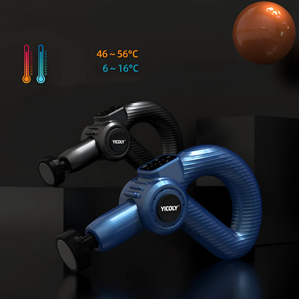 Black smart muscle massage gun with display, attached massage head, and additional heads on a table.