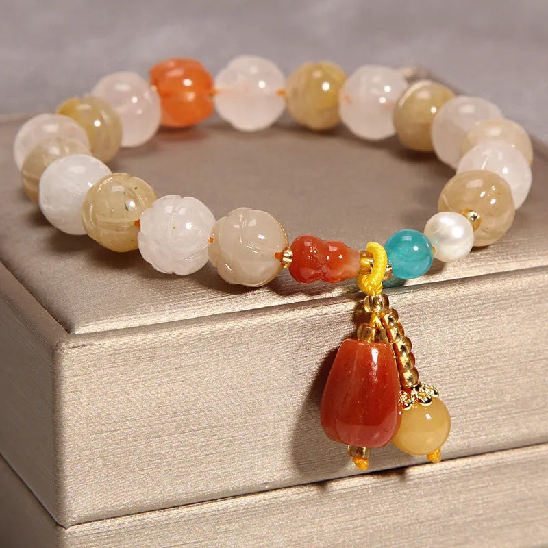 Yellow agate and crystal women's bracelet on gold silk cord with adjustable design