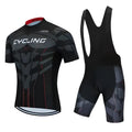 A man and woman wearing a matching moisture-wicking cycling jersey and shorts set for summer biking.