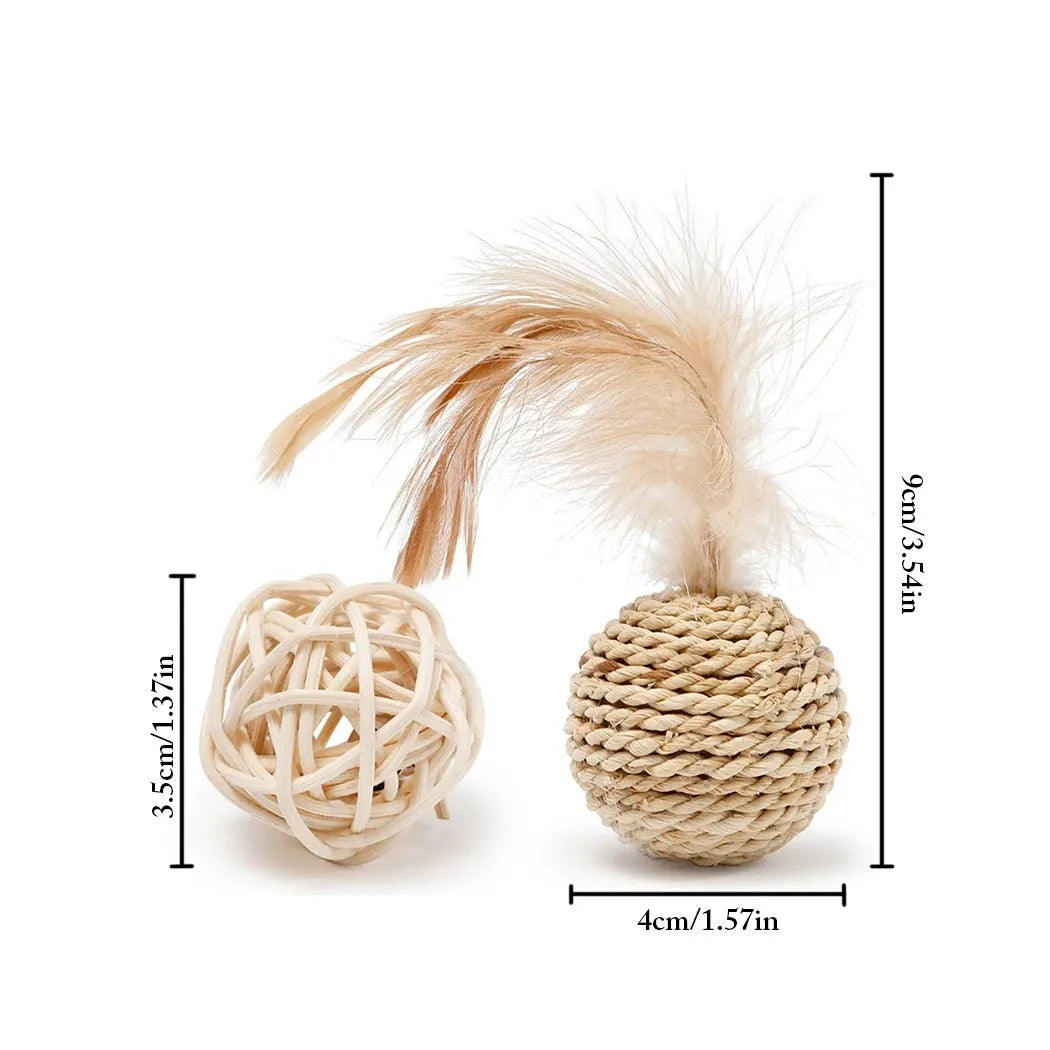 Cat toy set showing rattan ball with bell and faux feather ball on neutral background