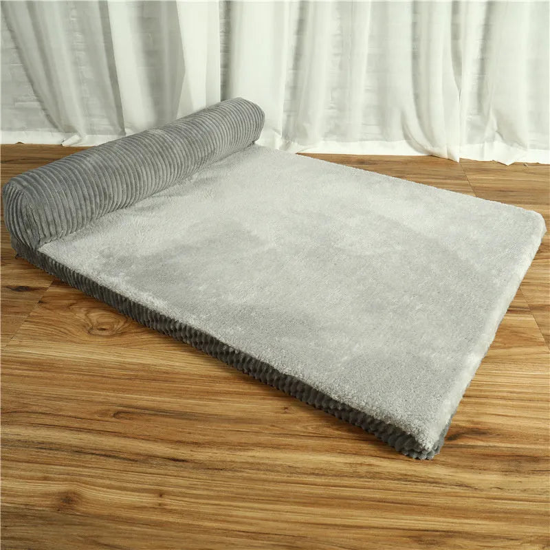 Corduroy pet dog sofa bed with non-slip base in a neutral colour on a wooden floor