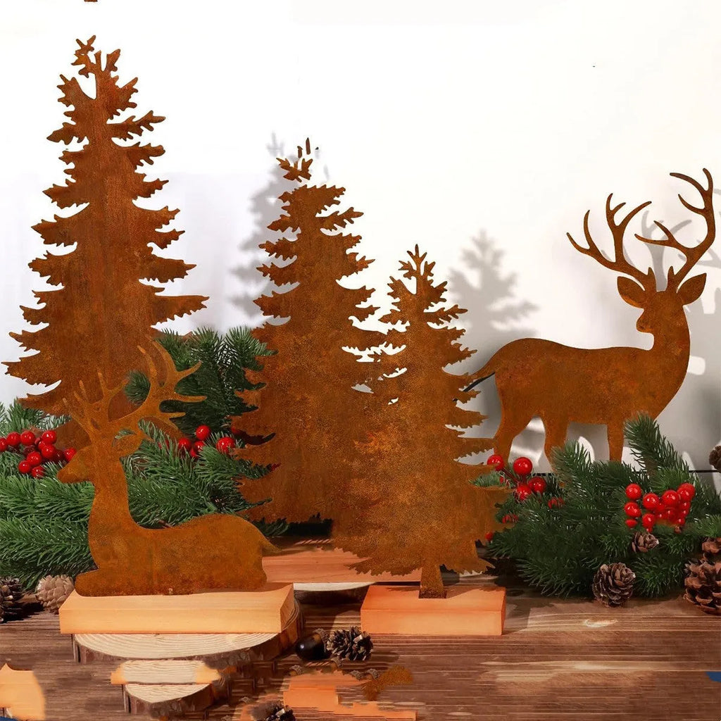 Three rusty metal Christmas decorations with elk and tree designs on white background