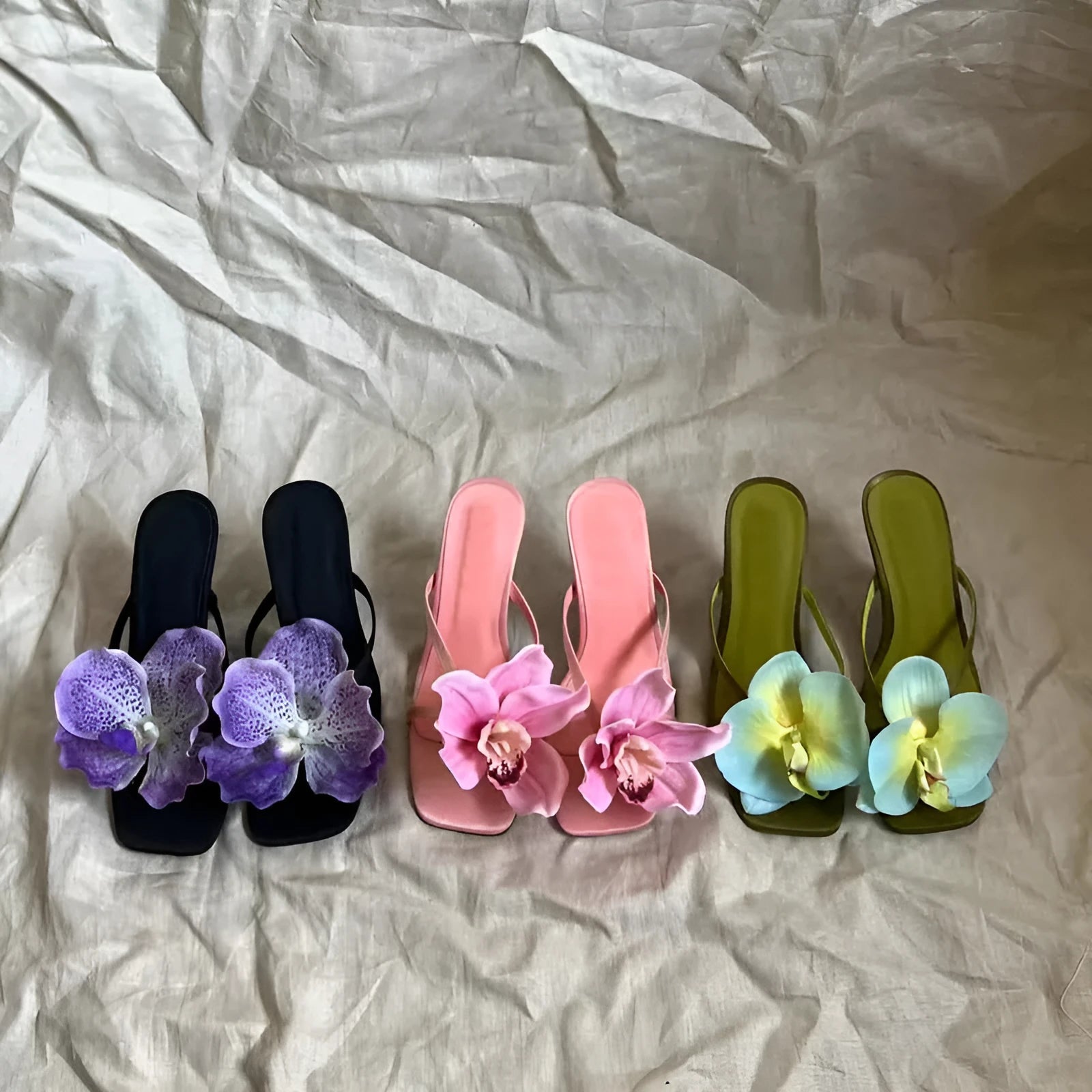 Pink satin square toe women's sandals with artificial phalaenopsis flower and mid heel