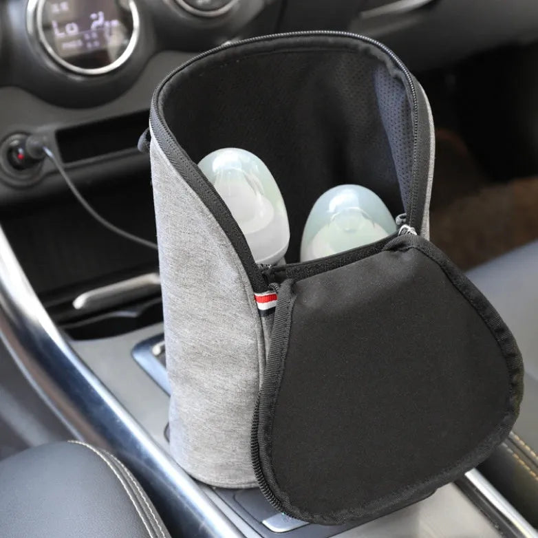 Grey Oxford cloth portable car USB baby bottle warmer showing electronic temperature display and hanging buckle.