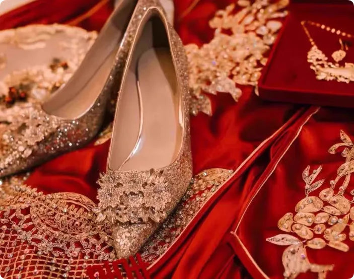 Champagne coloured bridal shoes with crystal rhinestones, pointed toe, and court heel.