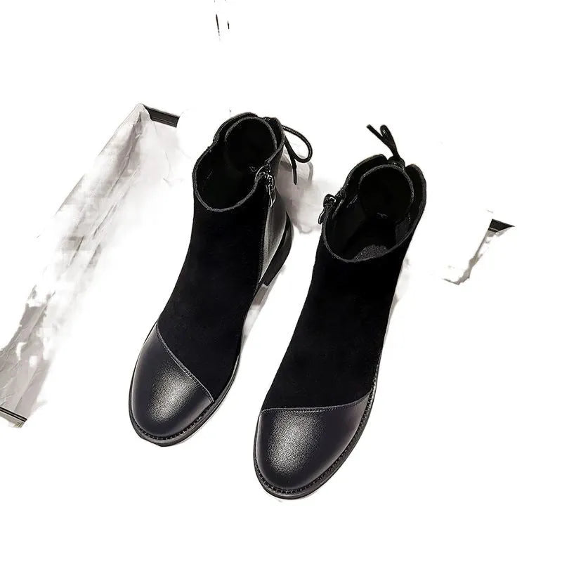 Black women's Martin boots with side zip, round toe, and short stout heel