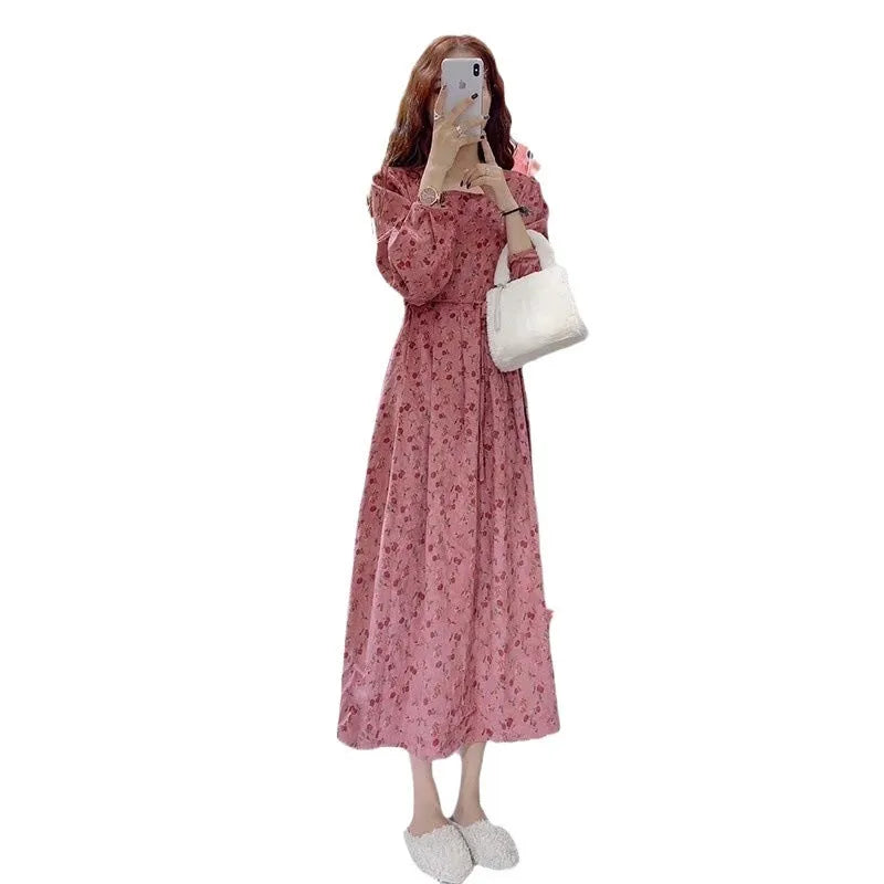Red floral sweet cover dress with high waist, elastic waist, princess sleeves, and mid-length skirt on a woman
