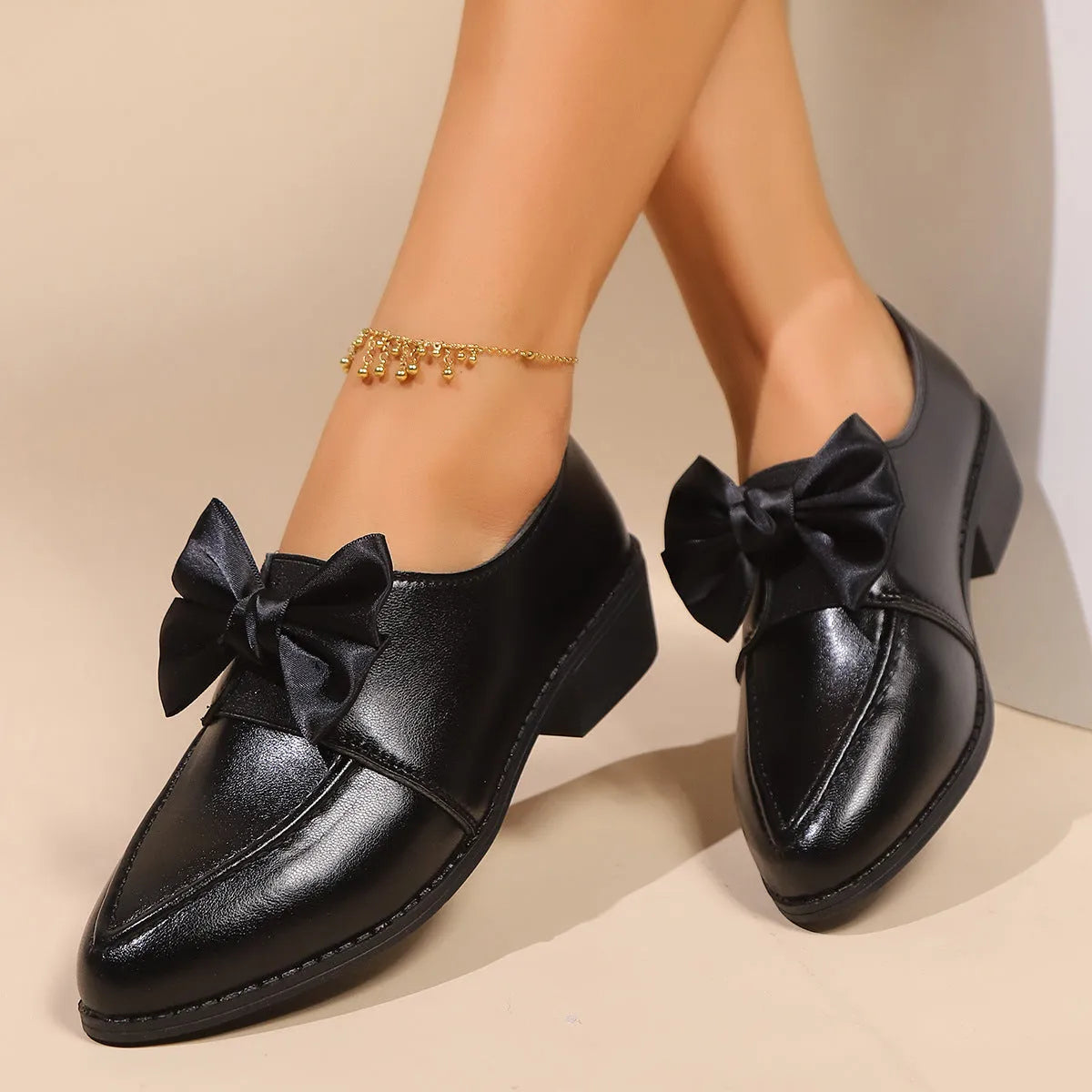Women's British-style leather shoes with decorative bow detailing on PU upper and rubber sole