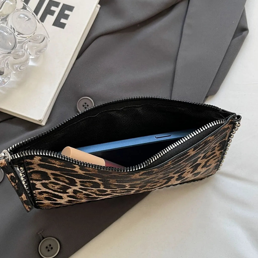 Women's casual crossbody underarm bag in brown PU with chain detail and horizontal square shape