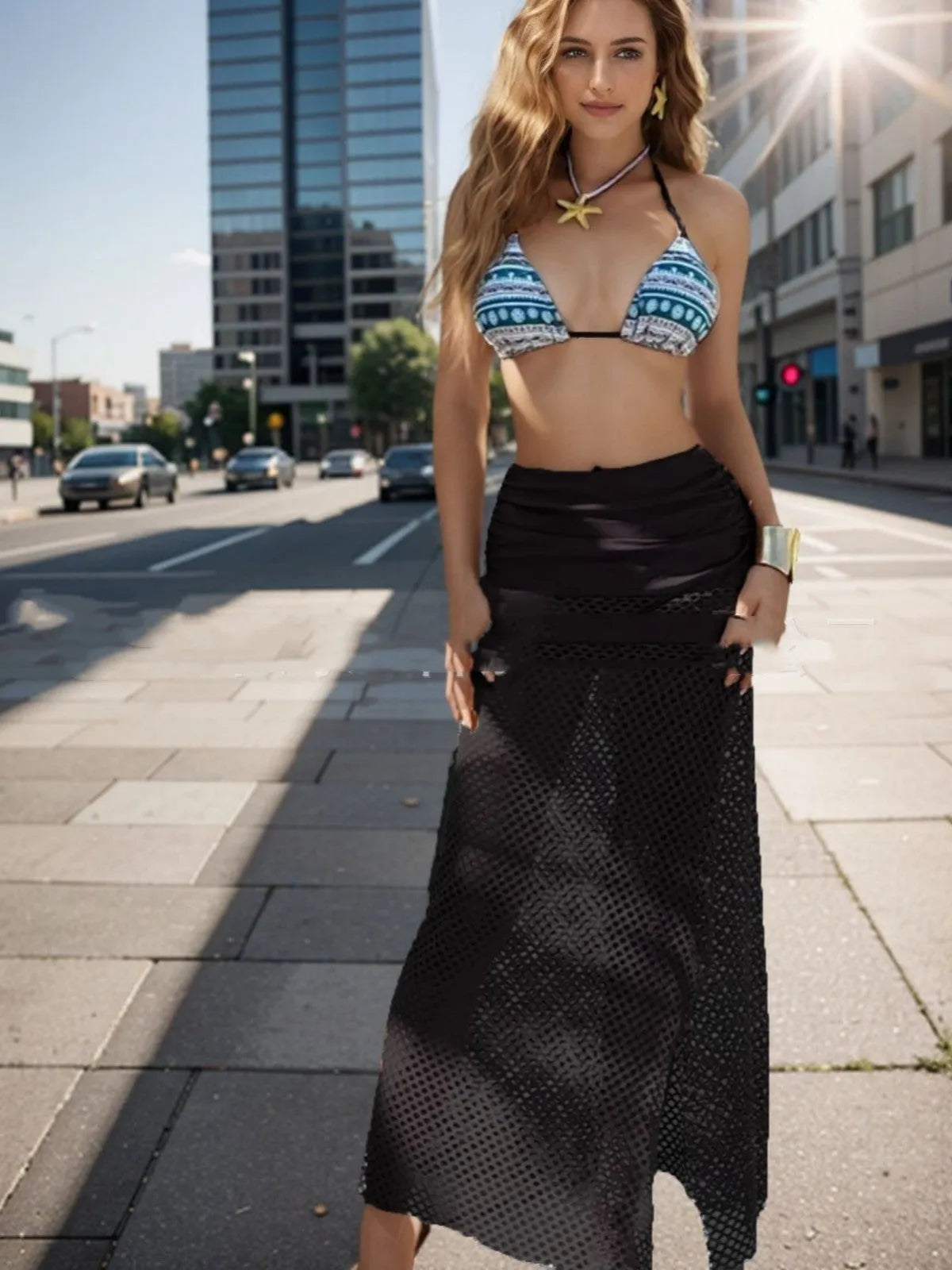 Women's brown gradient fishnet long skirt bikini three-piece set on a mannequin.