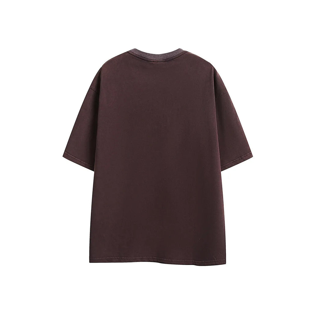 Retro loose fit half-sleeve T-shirt with embroidered detail in washed cotton fabric