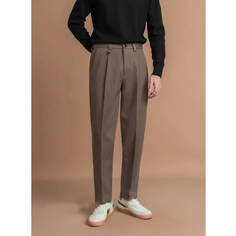 Men's straight leg suit trousers in draped fit, shown in dark grey colour.
