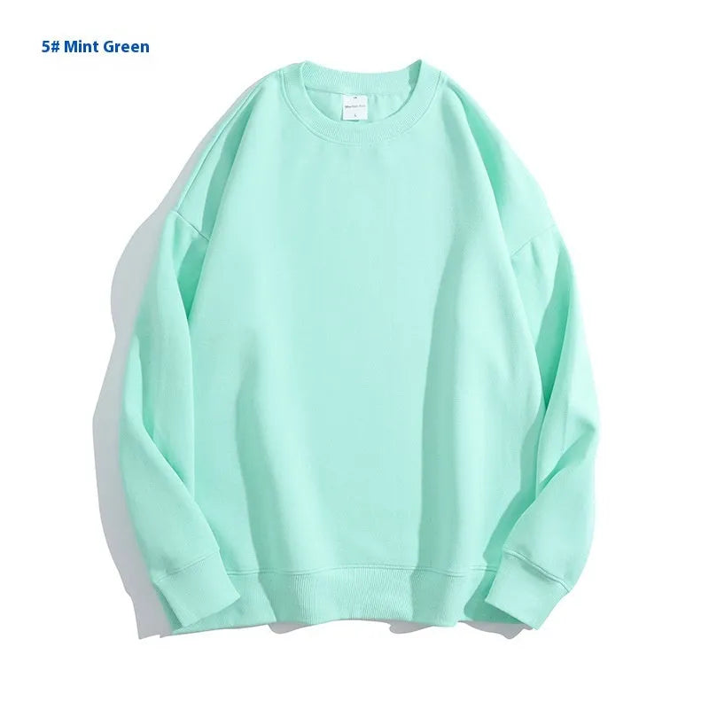 Cotton loose fit off shoulder sweater with round neck and long sleeves in various solid colours